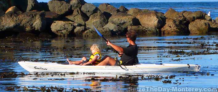 Kayaking with the kids off of the calm waters at Lover's Point Beach is great fun here in Monterey California!